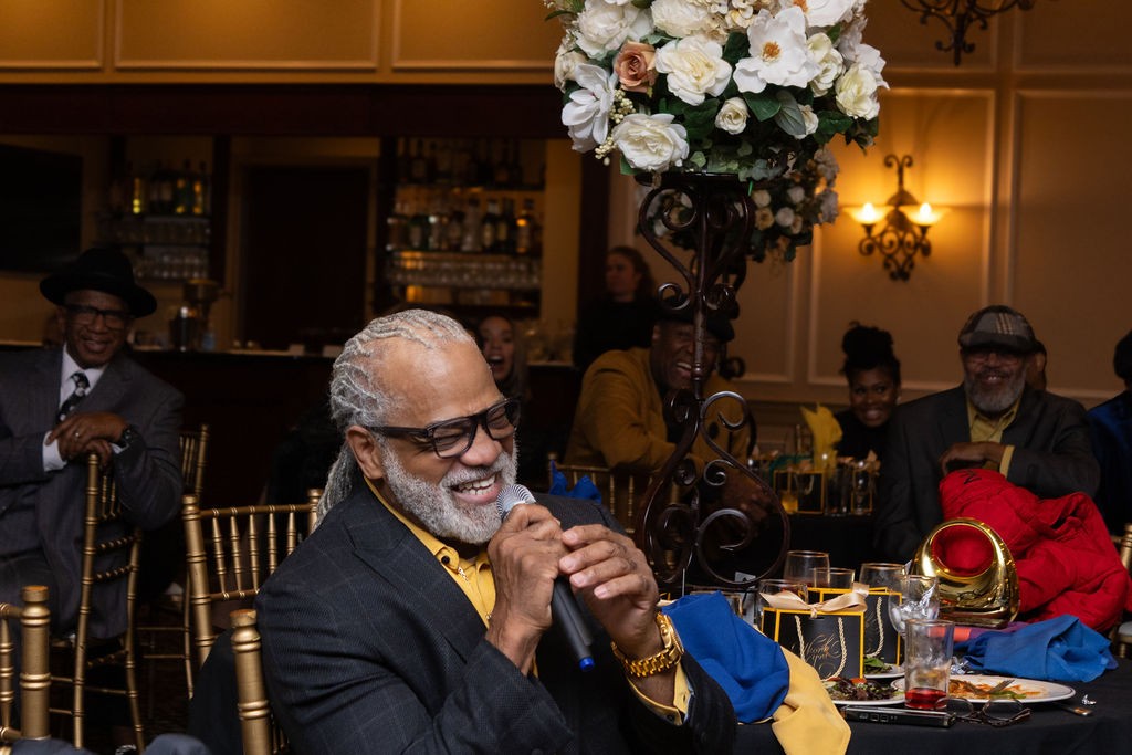 Pastor Motley laughing during the birthday program